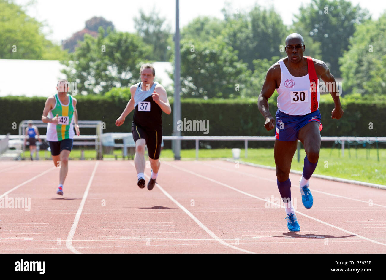 Masters athletics UK. Men`s 200m race. Stock Photo